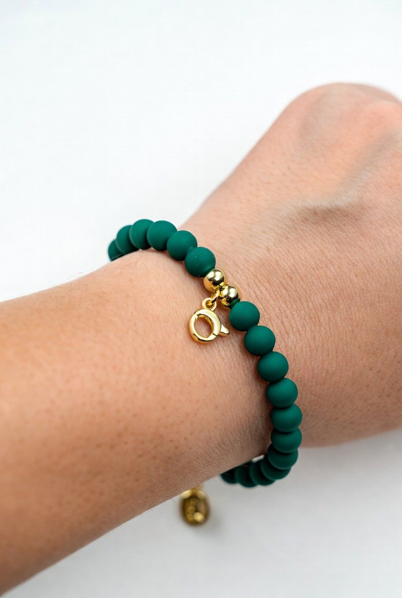 Dark green and gold silicone bead golf stroke counter bracelet