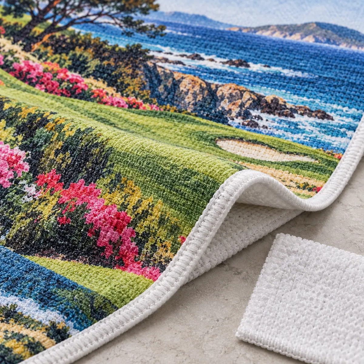 Full-Color Custom Golf Towels Close-up of full-color artwork on a golf towel fabric and bound edge